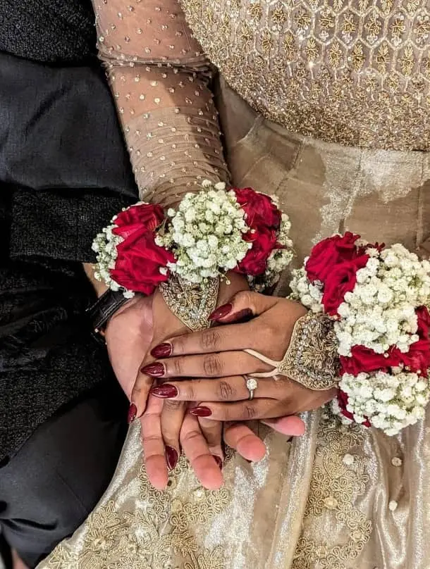 Custom fresh flower bracelet and ring set for Indian Pakistani wedding with colorful rose petals
